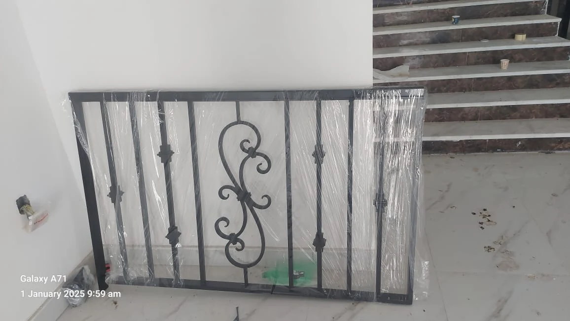 Staircase metal handrail