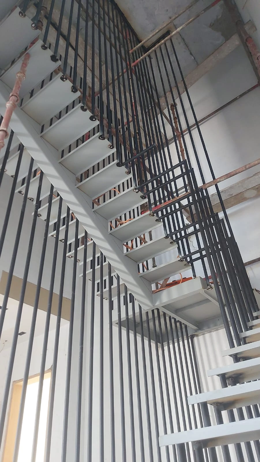 Staircase and metal balustrade