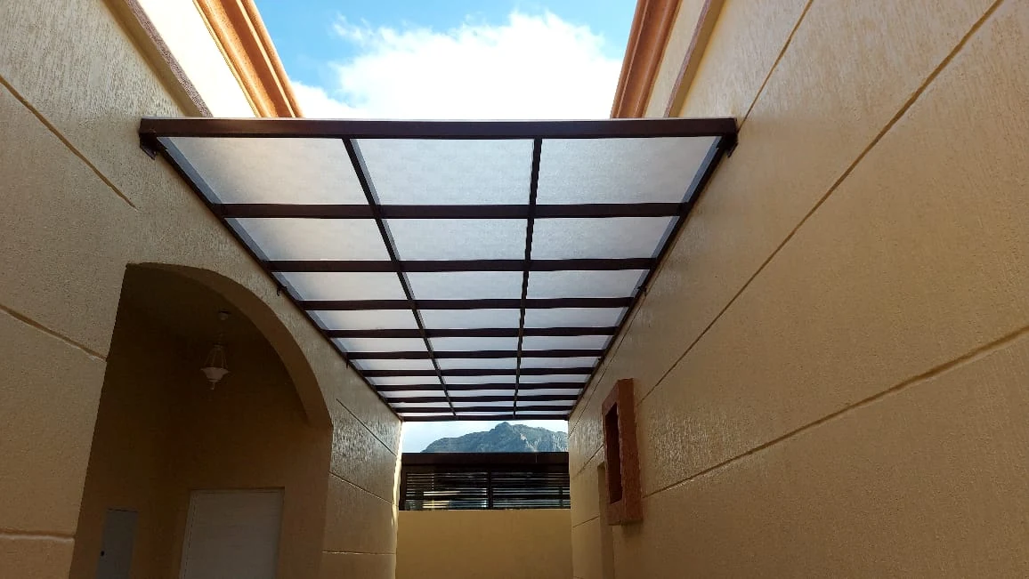 Framed translucent canopy over a passage