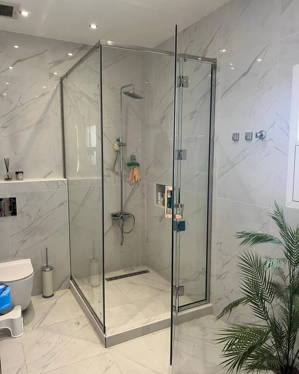 Shower glass and wall finishes