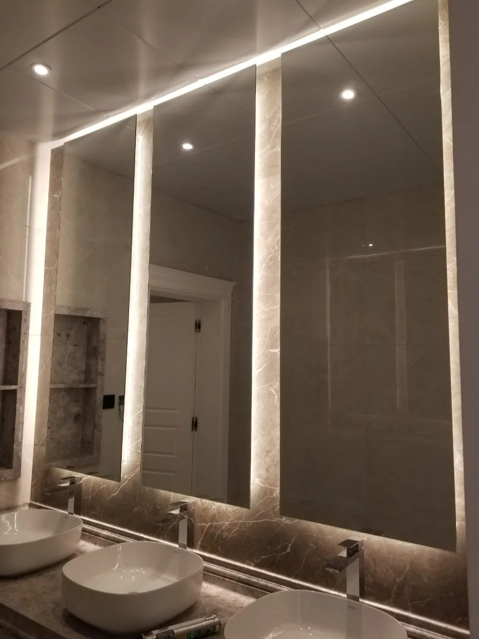 Tall illuminated mirrors