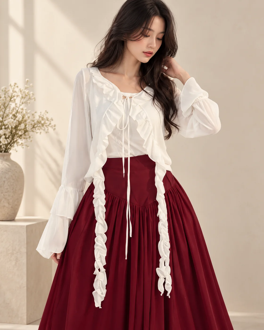 White ruffle top and maroon skirt detail