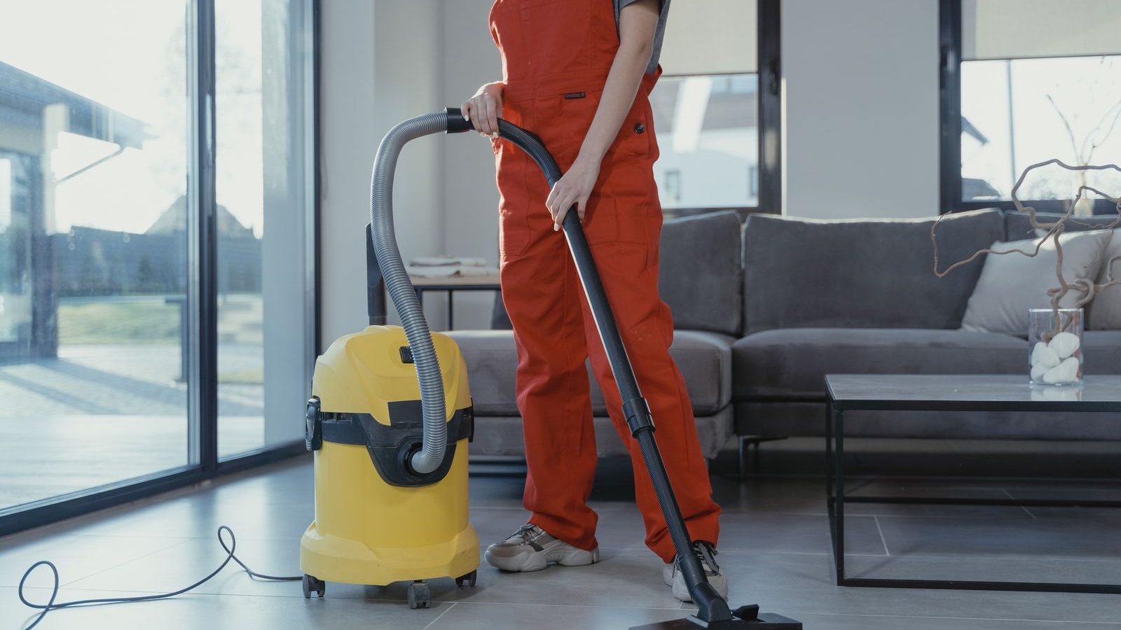 Home cleaning of a villa living area and kitchen