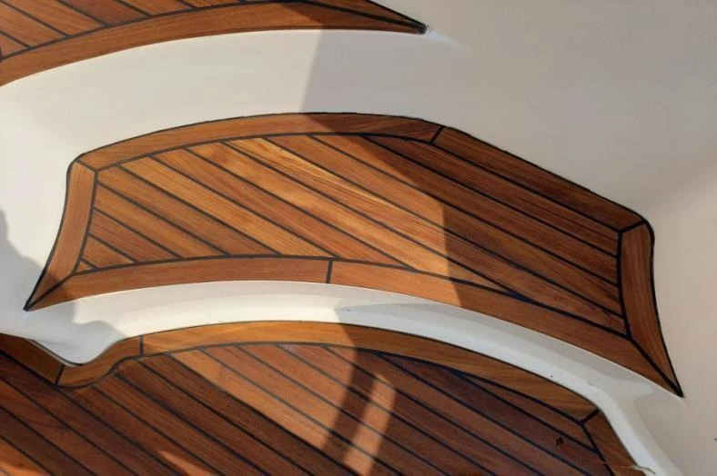 Curved teak deck steps