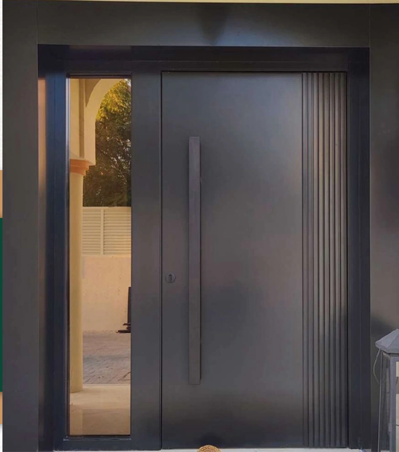 A dark entrance combining fluted detailing, a long handle and a wide glazed sidelight.