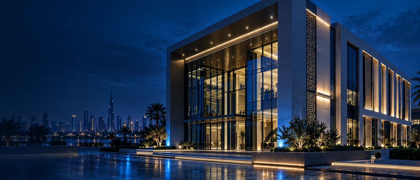Modern architectural property with illuminated exterior at blue hour